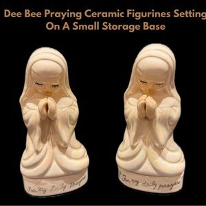 Dee Bee Praying Ceramic Figurines Setting On A Small Storage Base